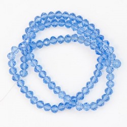 Намистини в низці (сині прозорі, 3 х 2 мм)