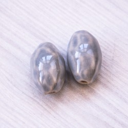 Керамічні намистини у вигляді овалу (26х17мм) сірі