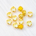 riv-1460 Ріволі (шатони) скляні круглі (жовтуватий опал, злегка АВ, 8 мм) в цапі