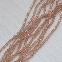 Намистини в низці (золотистий персик, злегка АВ) (конуси, 4 мм)