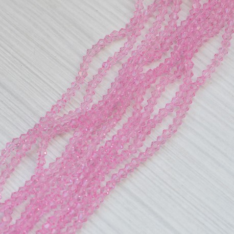 Намистини в низці (рожевий) (конуси, 4 мм)
